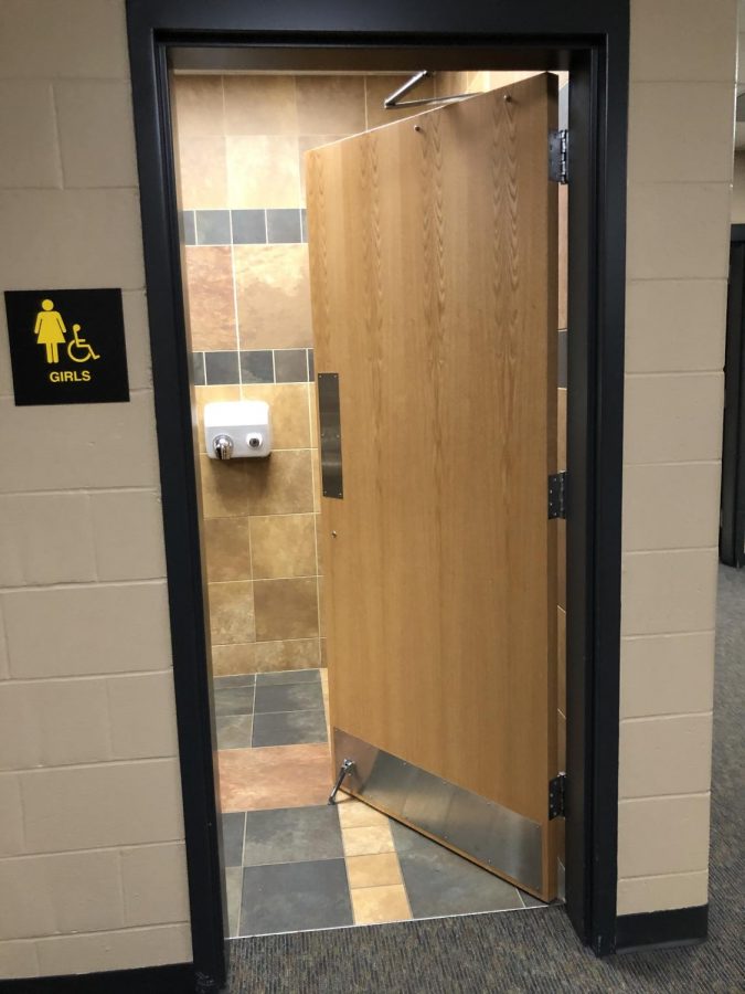 Door stops keep external bathroom doors open. Taylor Redenius photo.