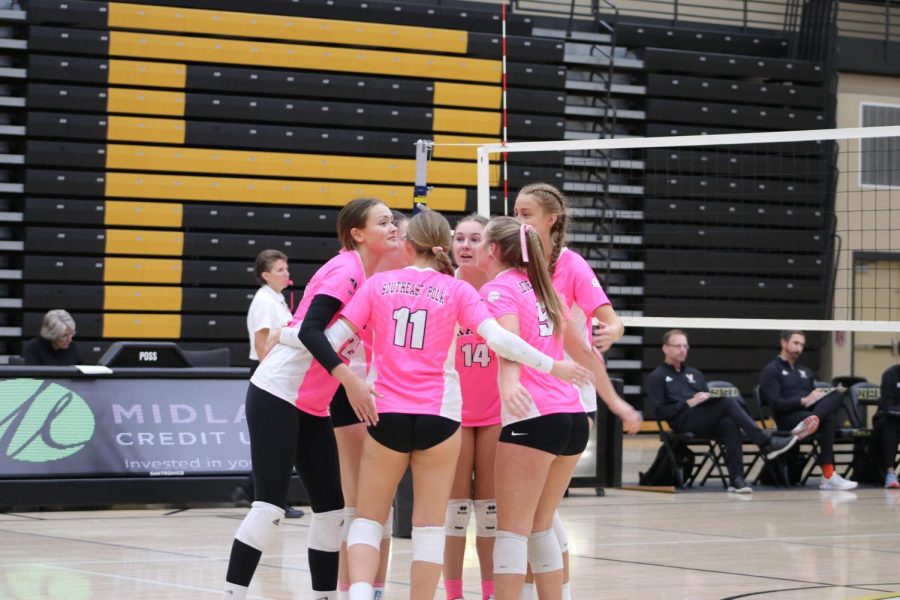 Members of the volleyball team huddle up. Gwen Willeford photo.