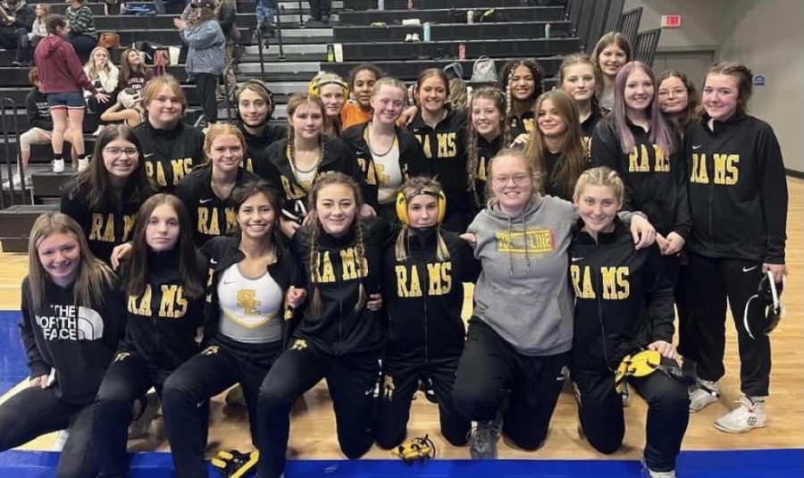 The girls’ wrestling team poses for a picture. Photo courtesy Maggie Crabb.