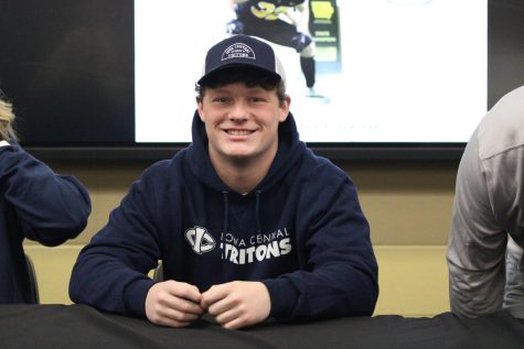 Drake Mayo during his signing. Jena Christensen photo.