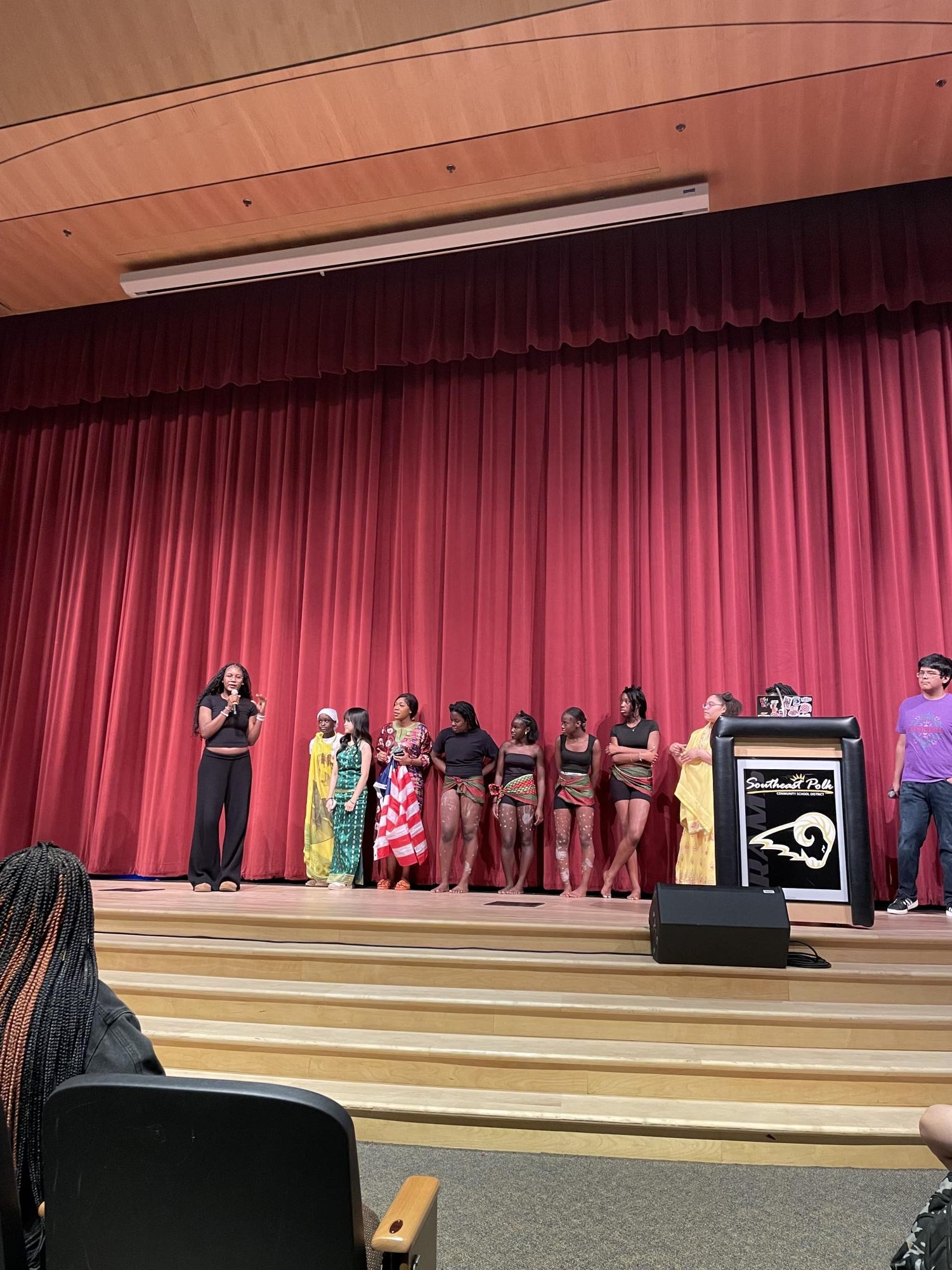Slangka Rene addresses the audience at the 2025 Culture Day presentations. Photo courtesy of Emily Lewis.